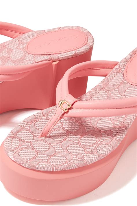 coach platform flip flops.